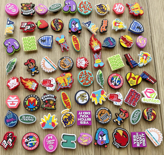 crocs charms designer